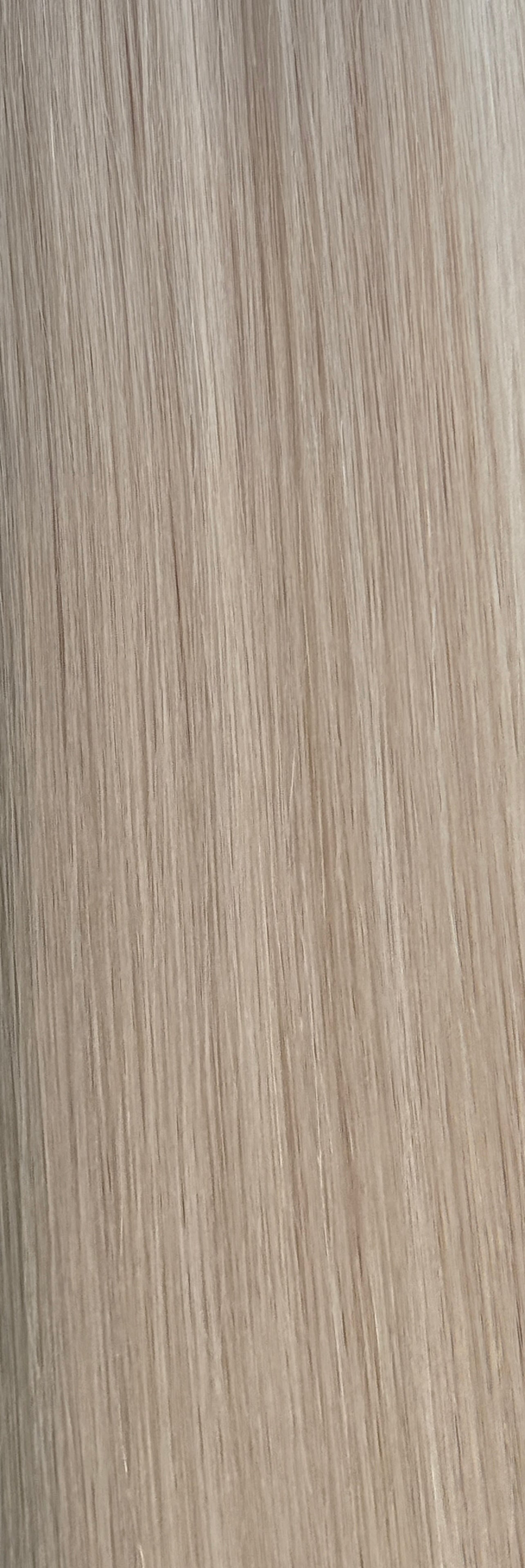 Andrea icy platinum blonde 18-inch genius weft hair extension by HIDDN